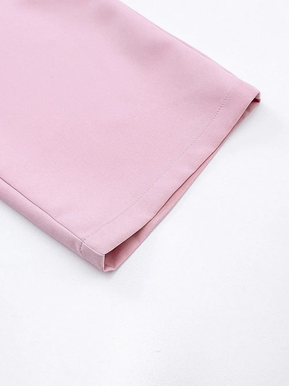 Blush Sleeveless Jumpsuit with Button-Up Front and Sash Tie